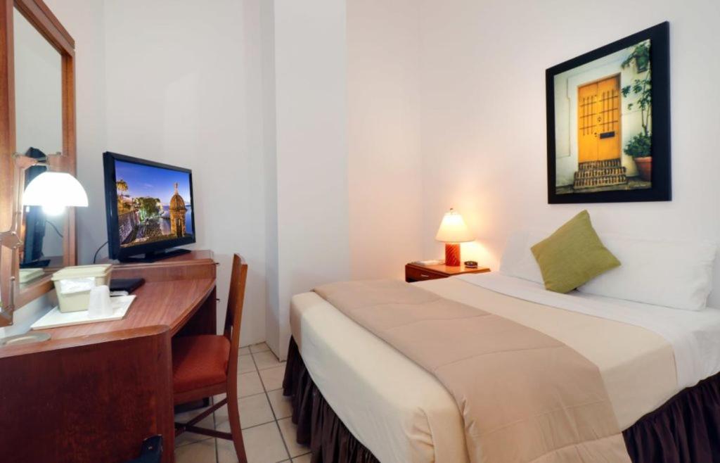 Armas Hotel San Juan Buitenkant foto